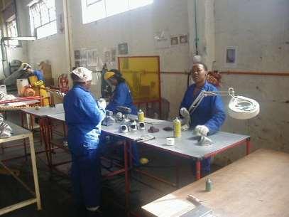 Engineering learners at a production workstation